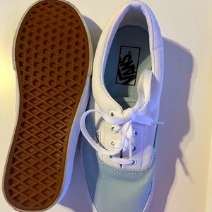 Baby blue and white low top vans